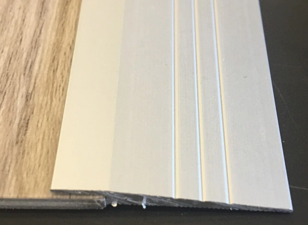 TIRA REMATE ALUM 2MM NP - TIRA DE REMATE ALUMINIO 2MM NATURAL NP1257RV2,0 (UNIDAD)