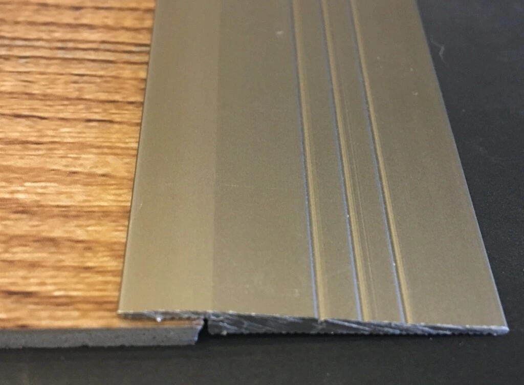 TIRA REMATE ALUM 3,2MM NP - TIRA DE REMATE ALUMINIO 3,2MM CHAMPAGNE NP1257RV3,2 (UNIDAD)