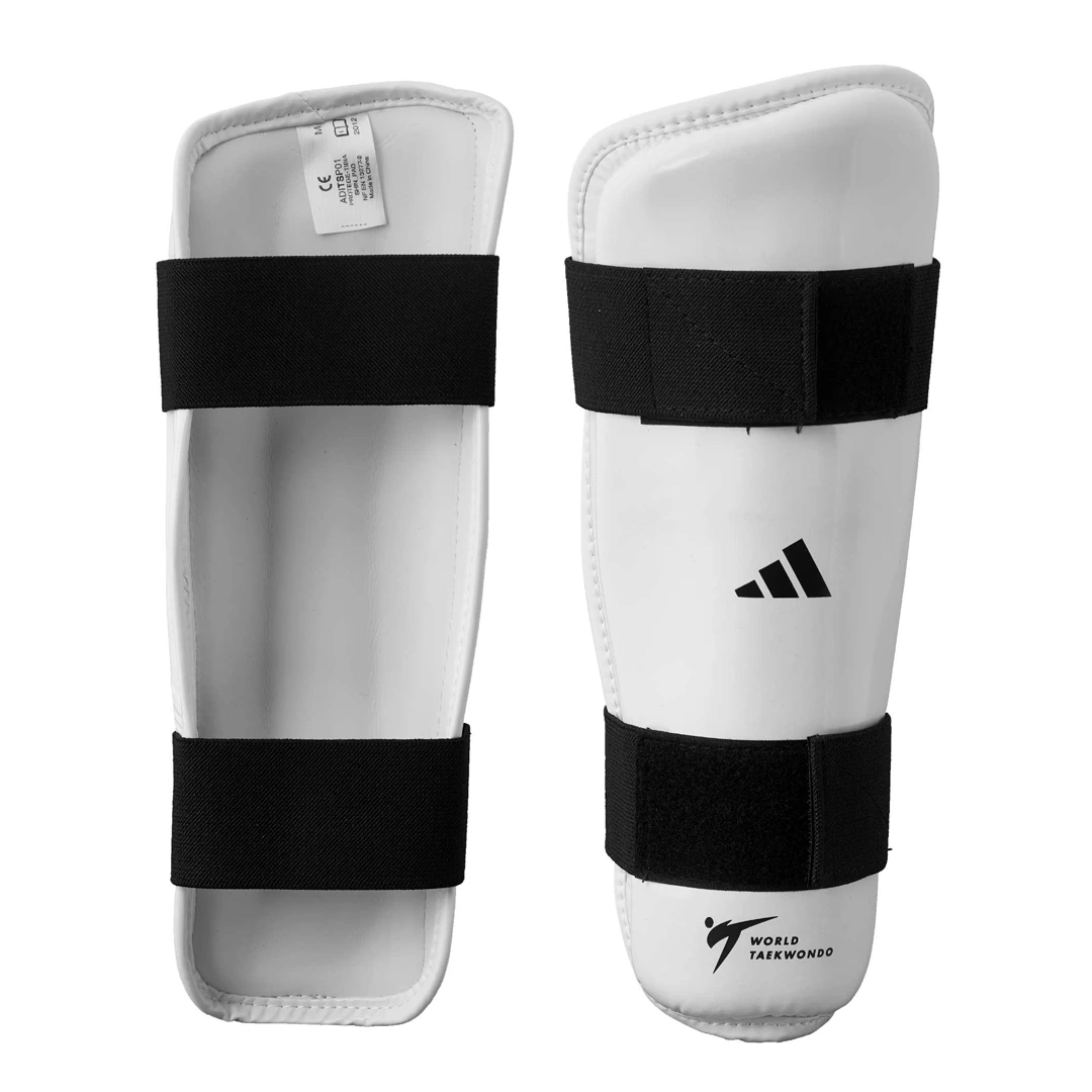 Espinillera Taekwondo Adidas WTF Blanca Espuma Absorbente Slip-On para Sparring y Competicion